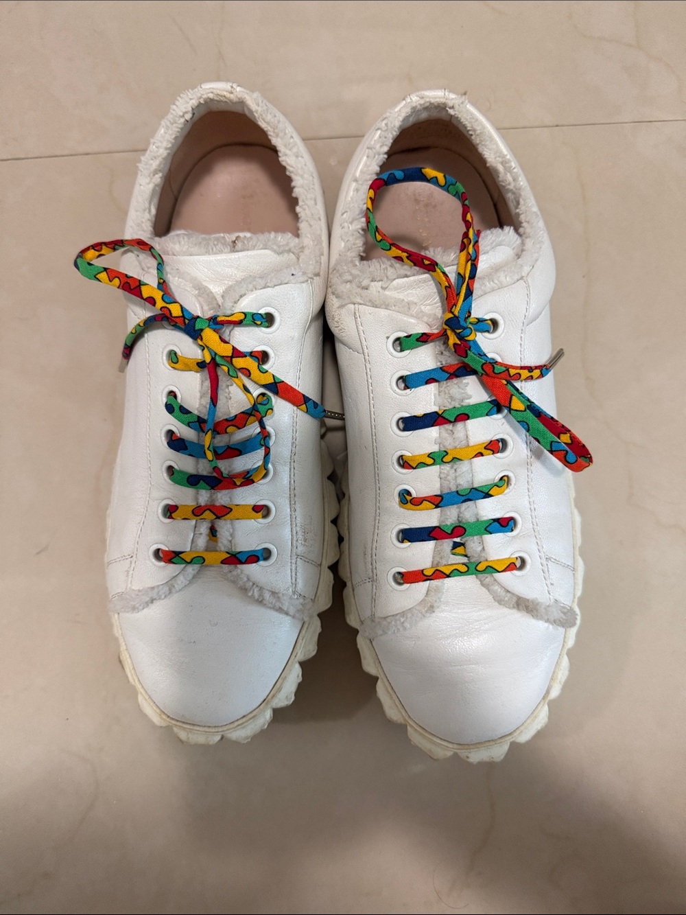 Stuart Weitzman White Sneakers with Colorful Laces rose motif soles